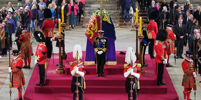 King Charles III, (C) Anne, Princess Royal, (L) Prince Andrew, Duke of York (Rear unseen) and Edward, Earl of Wessex (R) hold a vigil beside the coffin of their mother, Queen Elizabeth II, as it lies in state on the catafalque in Westminster Hall.