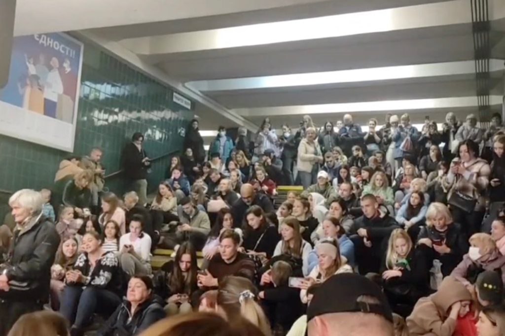 People pack stairs of a Kyiv station Monday.