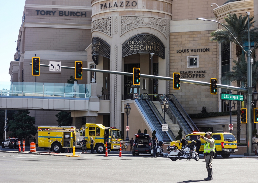 Police work at the scene where multiple people were stabbed in front of a Strip casino in Las Vegas, Thursday, Oct. 6, 2022. (Rachel Aston/Las Vegas Review-Journal via AP)