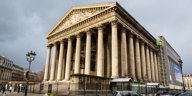 The exterior of Paris' L'église Sainte-Marie-Madeleine, known as the Madeleine Church in English.