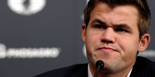 World chess champion Magnus Carlsen attends a news conference ahead of the 2016 World Chess Championship in New York City Nov. 10, 2016.