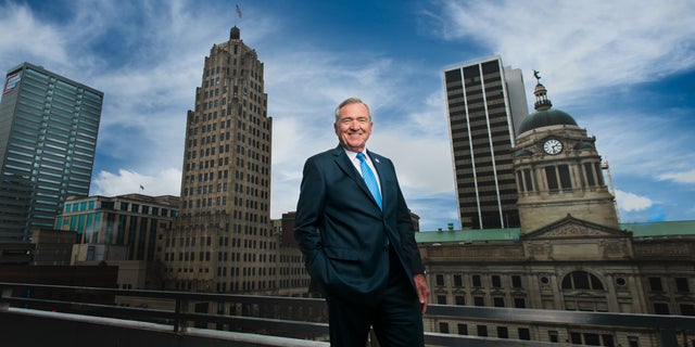 Mayor Tom Henry, a Democrat, stands in front of Fort Wayne. (Ft. Wayne)