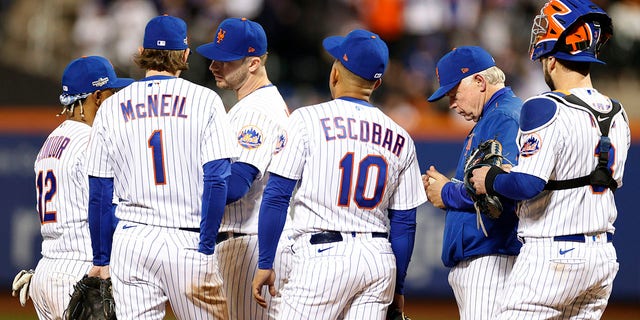 Buck Showalter #11 of the New York Mets visits the mound during the eighth inning against the San Diego Padres in game two of the Wild Card Series at Citi Field on Oct. 8, 2022 in New York City.