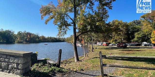 Princeton rescue personnel seen searching the Carnegie Lake near the Class of 1887 Boathouse on Princeton University campus.