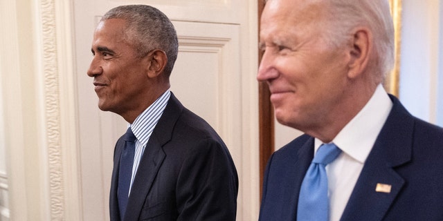 Former U.S. President Barack Obama and U.S. President Joe Biden arrive at a ceremony to unveil the official Obama White House portraits at the White House on Sept. 7, 2022, in Washington, DC. 