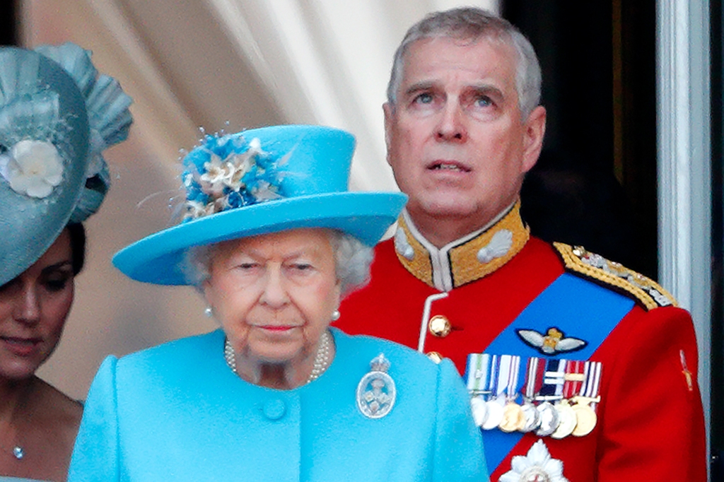 LONDON, UNITED KINGDOM - JUNE 09: (EMBARGOED FOR PUBLICATION IN UK NEWSPAPERS UNTIL 24 HOURS AFTER CREATE DATE AND TIME) Queen Elizabeth II and Prince Andrew, Duke of York (wearing the uniform of Colonel of the Grenadier Guards) watch a flypast from the balcony of Buckingham Palace during Trooping The Colour, the Queen's annual birthday parade on June 9, 2018 in London, England. The annual ceremony involving over 1400 guardsmen and cavalry, is believed to have first been performed during the reign of King Charles II. The parade marks the official birthday of the Sovereign, even though the Queen's actual birthday is on April 21st. (Photo by Max Mumby/Indigo/Getty Images)