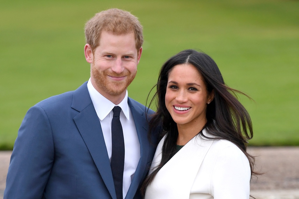 Prince Harry and Meghan Markle attend an official photocall to announce their engagement at The Sunken Gardens at Kensington Palace on November 27, 2017 in London, England.  