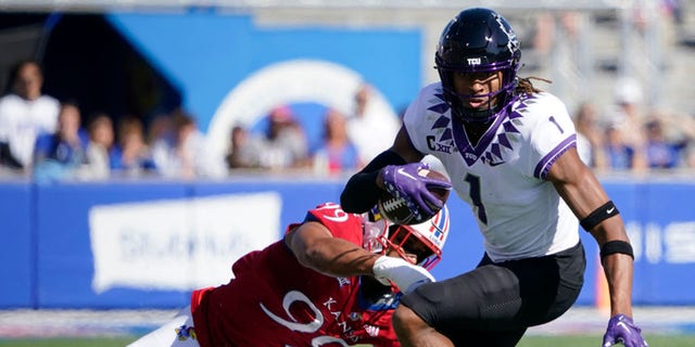 TCU wide receiver Quentin Johnston (1) catches a pass against Kansas in the first half at David Booth Kansas Memorial Stadium on Oct. 8, 2022, in Lawrence, Kansas.