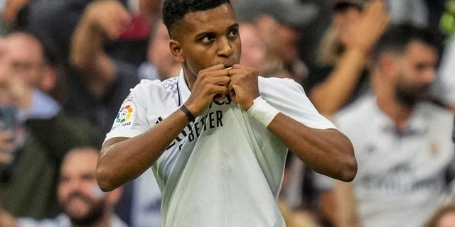 Real Madrid's Rodrygo celebrates after scoring a penalty kick against FC Barcelona in Madrid, Spain, on Sunday, Oct. 16, 2022.