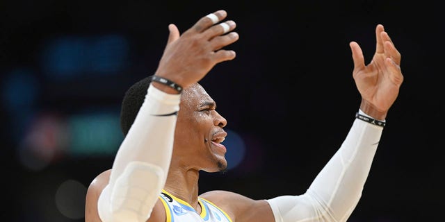 Los Angeles Lakers guard Russell Westbrook pumps up the crowd during an NBA basketball game against the Denver Nuggets, Sunday, Oct. 30, 2022, in Los Angeles. 