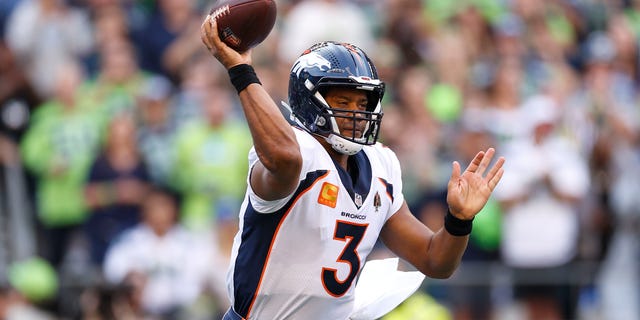 Russell Wilson of the Denver Broncos passes during the first quarter against the Seattle Seahawks at Lumen Field on Sept. 12, 2022, in Seattle.