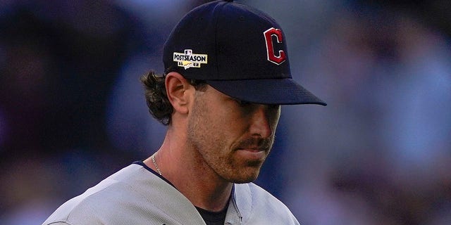 Cleveland Guardians starting pitcher Shane Bieber walks off the field as he is relieved during the seventh inning of Game 2 of an American League Division Series against the New York Yankees Friday, Oct. 14, 2022, in New York. 