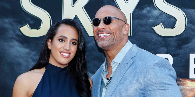 Actor Dwayne Johnson and his daughter Simone Alexandra Johnson attend the premiere of "Skyscraper" on July 10, 2018 in New York City.