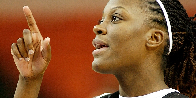 Texas forward Tiffany Jackson, #33, points during Big 12 women's basketball tournament practice Monday, March 5, 2007 in Oklahoma City.