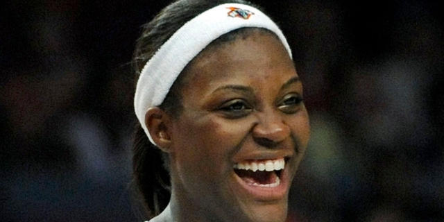 New York Liberty forward Tiffany Jackson smiles during the fourth quarter as the Liberty beat the Phoenix Mercury 105-72 in a WNBA basketball game Sunday, June 22, 2008 at Madison Square Garden in New York.