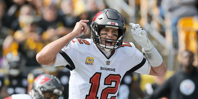 Tampa Bay Buccaneers quarterback Tom Brady (12) gives signals during the game against the Pittsburgh Steelers in Pittsburgh on Oct. 16, 2022.