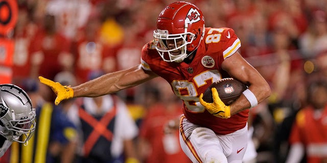 Chiefs tight end Travis Kelce heads for the end zone on an 8-yard touchdown catch against the Las Vegas Raiders, Monday, Oct. 10, 2022, in Kansas City, Missouri.