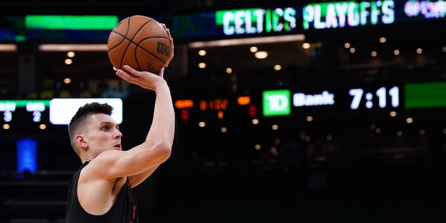 May 21, 2022; Boston, Massachusetts, USA; Miami Heat guard Tyler Herro (14) warms up before game three of the 2022 eastern conference finals against the Boston Celtics at TD Garden.