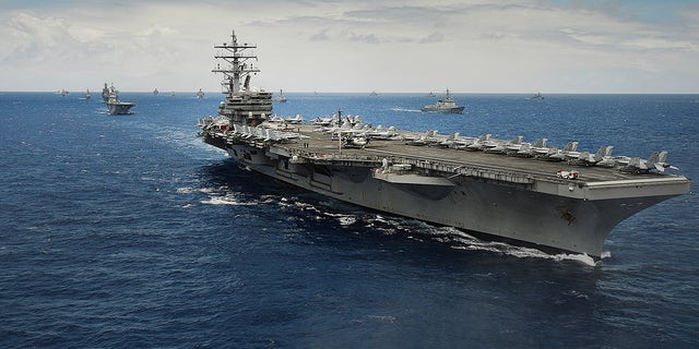 The USS Ronald Reagan participates in the Rim of the Pacific (RIMPAC) Exercise 2014, along with ships from 15 other nations.