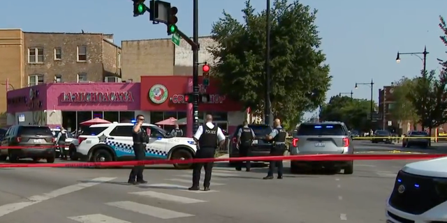 Four people in Chicago were injured on Aug. 21 during a drive-by shooting outside a high school on the city's Northwest side.