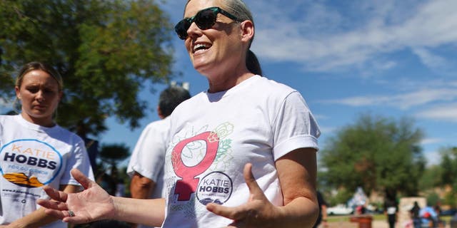 Arizona Secretary of State and Democratic gubernatorial candidate Katie Hobbs is interviewed after speaking at a Women's March rally on October 8, 2022.
