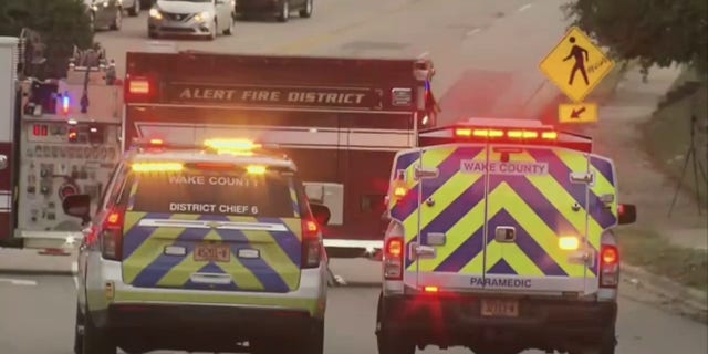 Emergency response vehicles in an east Raleigh neighborhood.