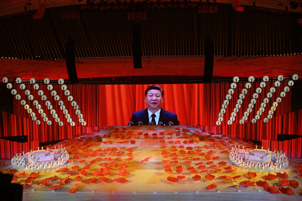 Chinese President Xi Jinping is seen on a large screen during a Cultural Performance as part of the celebration of the 100th Anniversary of the Founding of the Communist Party of China, at the Bird's nest national stadium in Beijing on June 28, 2021.