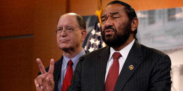 Reps. Al Green, D-Texas, and Brad Sherman, D-Calif., discuss impeachment efforts on Capitol Hill in 2017.