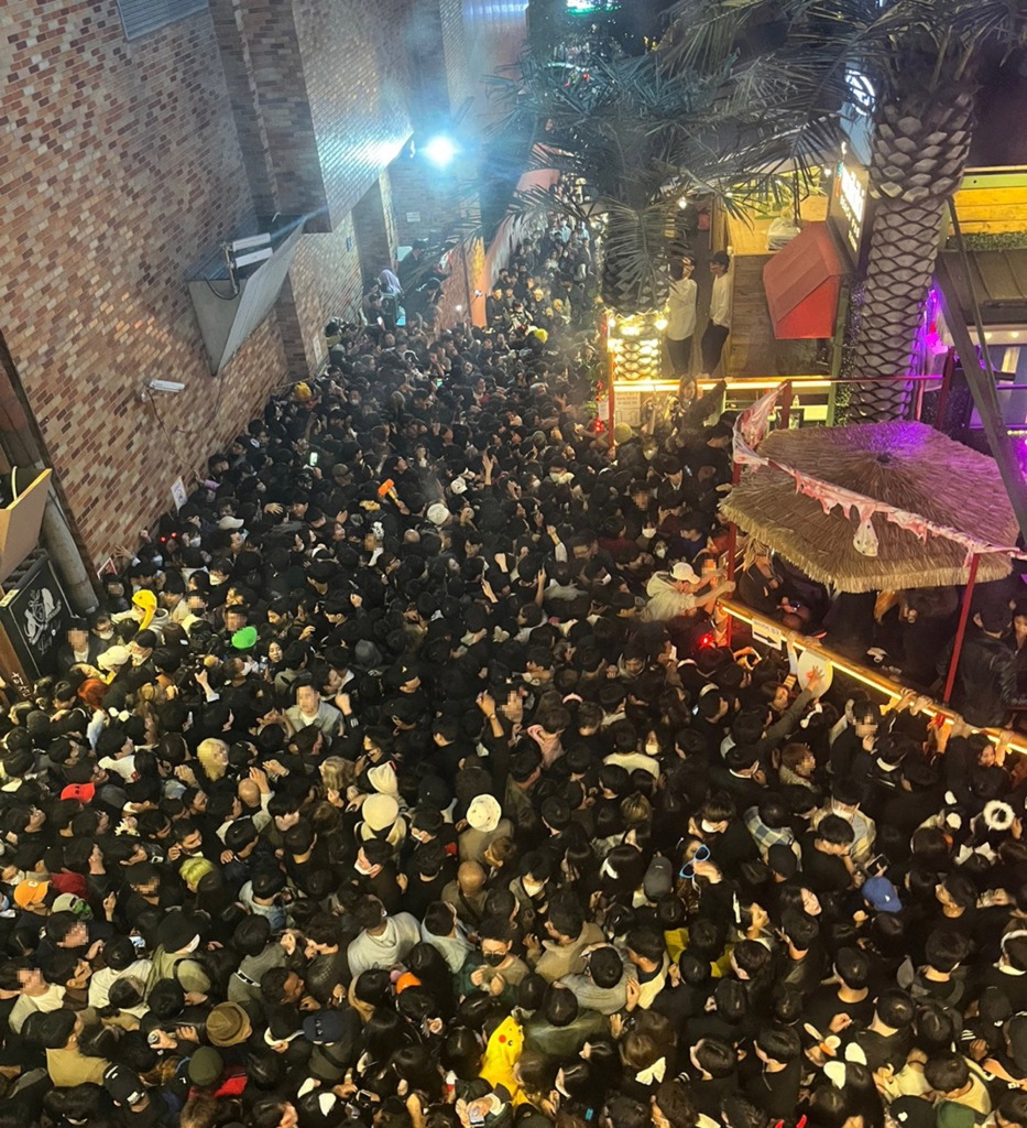 A street in Itaewon district is pictured full of people before a stampede.