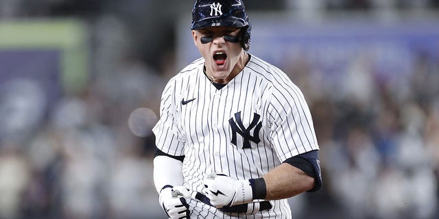 Harrison Bader #22 of the New York Yankees celebrates after hitting a solo home run against Cal Quantrill #47 of the Cleveland Guardians during the third inning in game one of the American League Division Series at Yankee Stadium on October 11, 2022 in New York, New York.