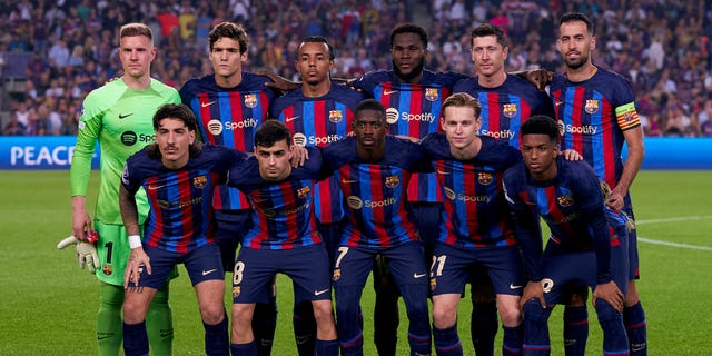 Players of FC Barcelona line up for a team photo prior to the UEFA Champions League group C match between FC Barcelona and FC Bayern München at Spotify Camp Nou on Oct. 26, 2022 in Barcelona, Spain.