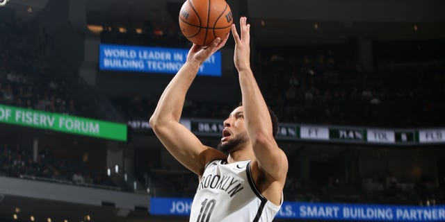 Ben Simmons #10 of the Brooklyn Nets drives to the basket during the game against the Milwaukee Bucks  on October 26, 2022 at the Fiserv Forum Center in Milwaukee, Wisconsin.