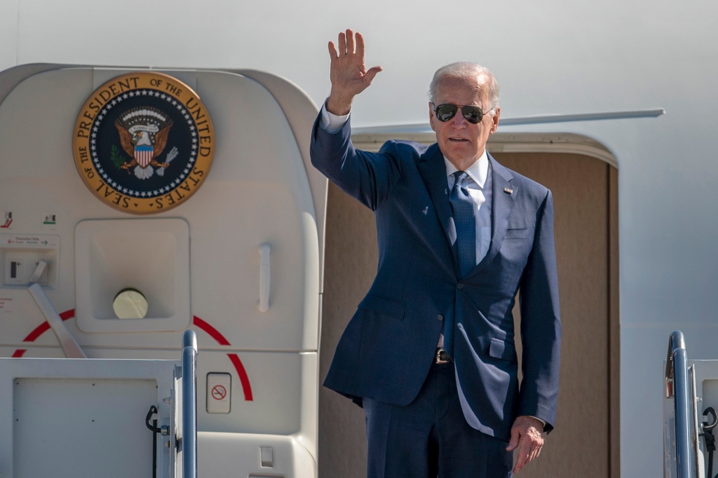 A picture of President Biden boarding onto Air Force One.