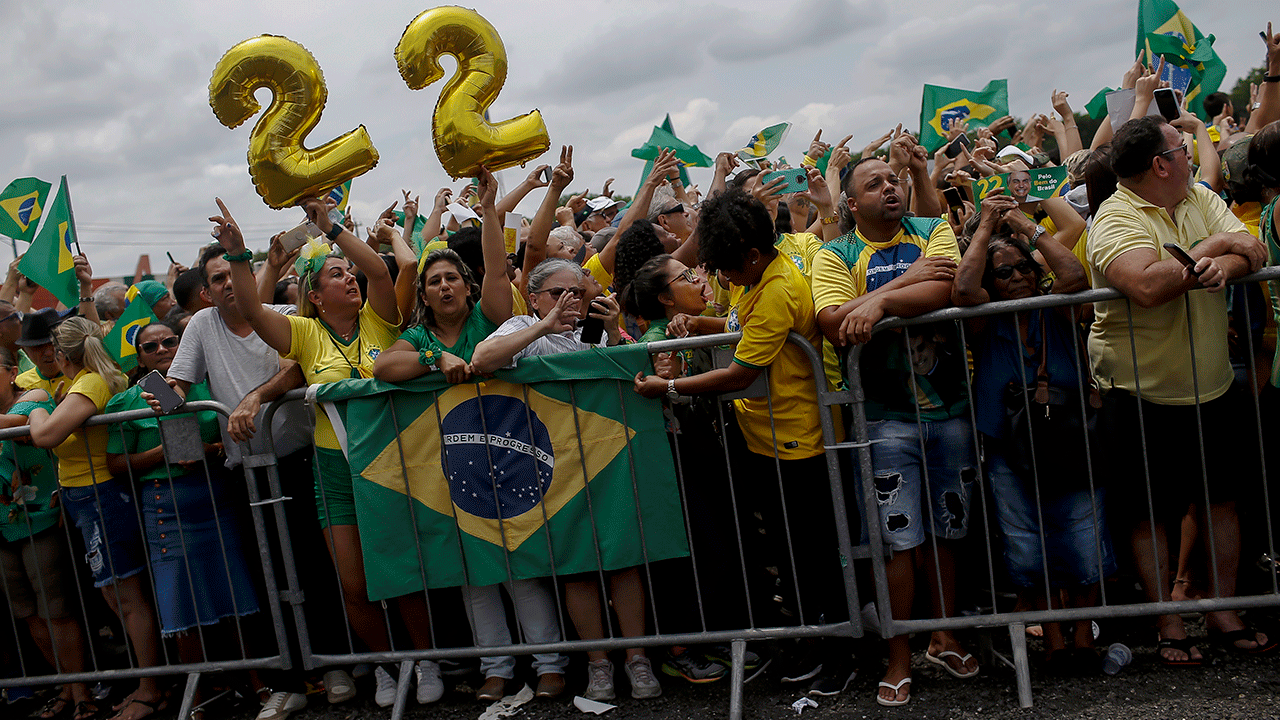 Supporters of Brazilian President Jair Bolsonaro hold up the number 22, which is his number on election ballots, during his campaign rally for reelection in Sao Goncalo, Rio de Janeiro state, Brazil, Tuesday, Oct. 18, 2022. The presidential run-off election is set for Oct. 30.