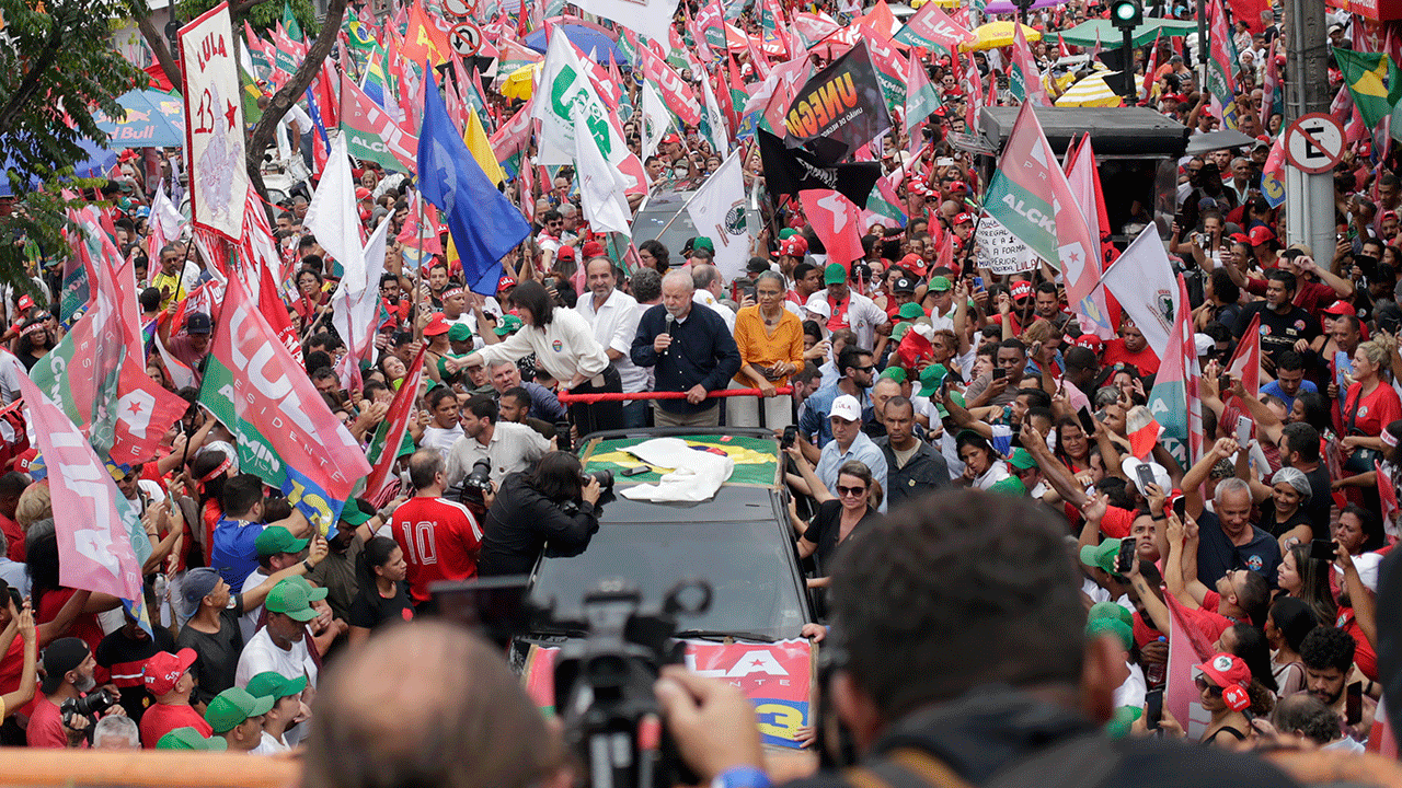 Brazil's former President Luiz Inacio Lula da Silva, who is running for president again, greets supporters during a campaign rally in Belo Horizonte, Brazil, Saturday, Oct. 22, 2022. Da Silva will face incumbent President Jair Bolsonaro in a presidential runoff on Oct. 30.