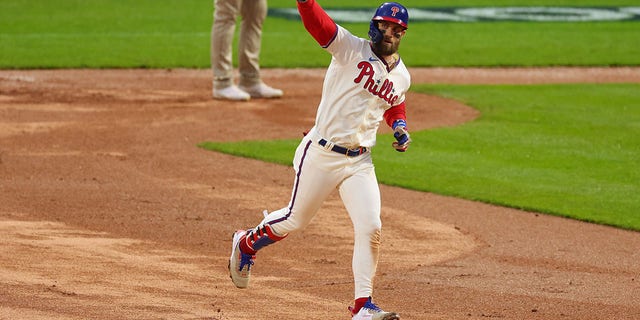 Bryce Harper #3 of the Philadelphia Phillies runs the bases after hitting a two run home run during the eighth inning against the San Diego Padres in game five of the National League Championship Series at Citizens Bank Park on October 23, 2022 in Philadelphia, Pennsylvania.