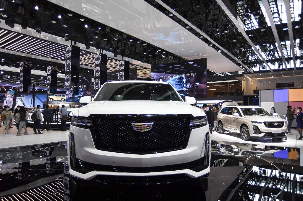 A white Cadillac Escalade is on displayed during the 19th Shanghai International Automobile Industry Exhibition.