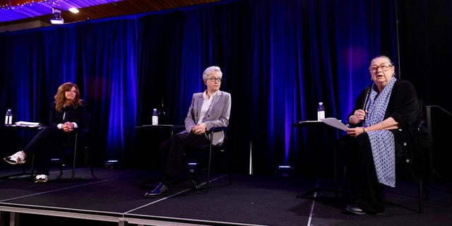 Republican nominee Christine Drazan, left, and Democratic nominee Tina Kotek, middle, listen to unaffiliated candidate Betsy Johnson speak during the gubernatorial debate hosted by Oregon Newspaper Publishers Association at Mount Hood Oregon Resort in Welches, Ore., Friday, July 29, 2022. 