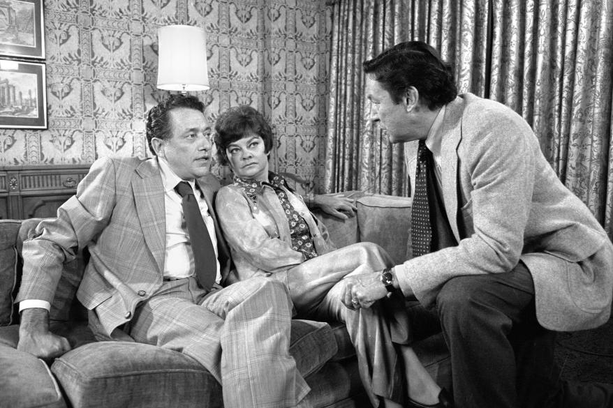 A picture of Mike Wallace (right) interviews former agent Clint Hill and Gwen Hill. Clint, the Secret Service agent after the assassination of John F. Kennedy.