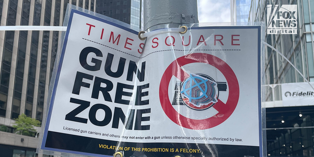 Signs read "Gun Free Zone" in New York City's Manhattan borough. 