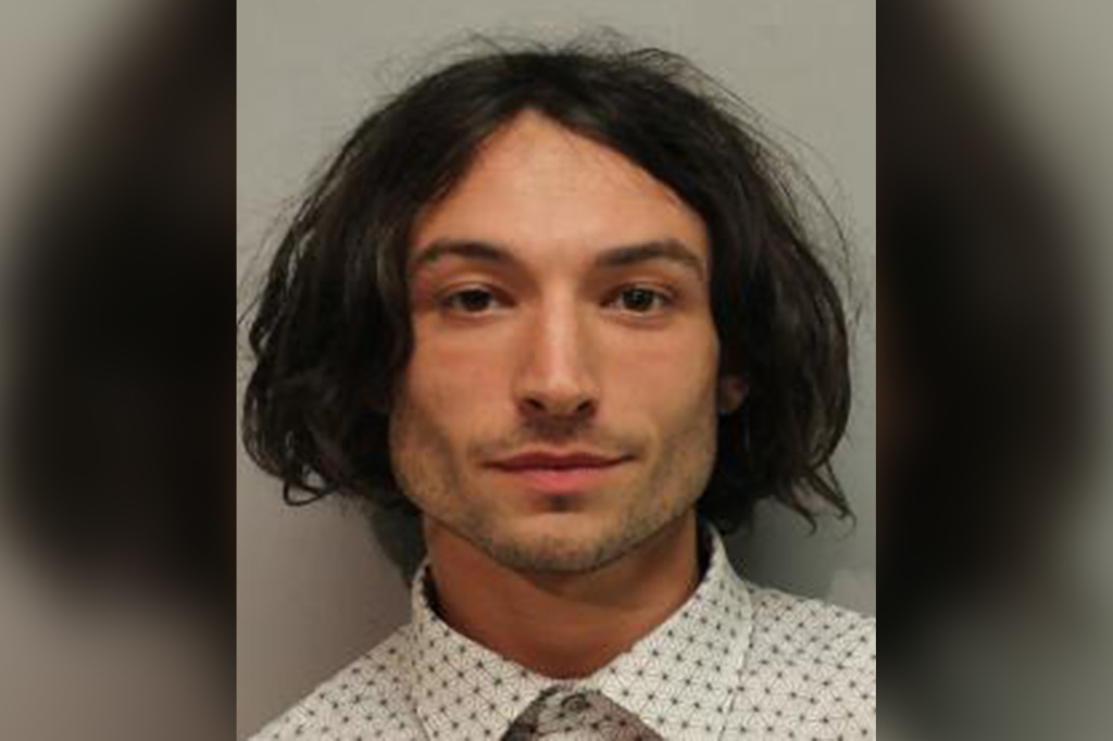 Ezra Miller is seen in a police booking photo after their arrest for disorderly conduct and harassment on March 28, 2022 in Hilo, Hawaii.
