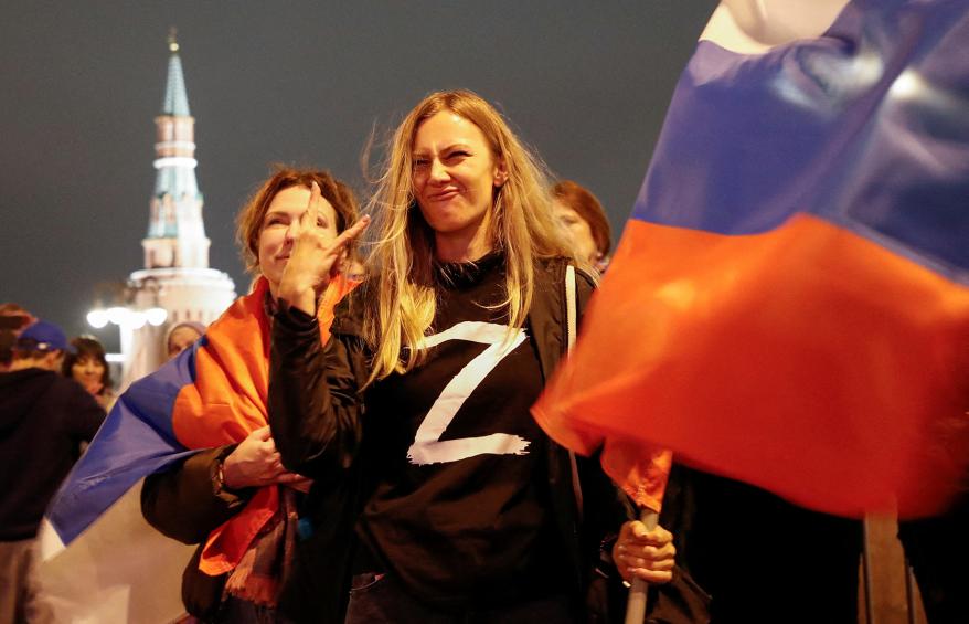 A spectator reacts during a concert marking the declared annexation of the Russian-controlled territories of Ukraine.