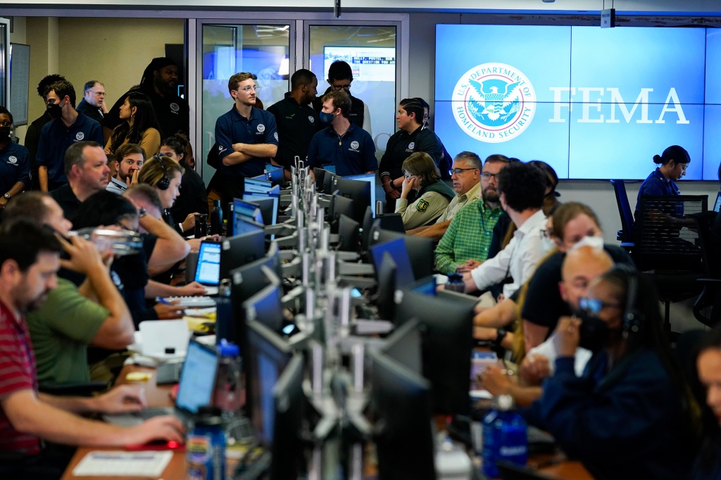 People work at FEMA headquarters, Thursday, Sept. 29, 2022, in Washington