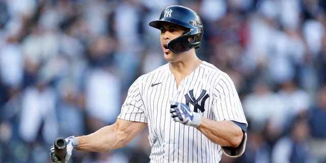 Giancarlo Stanton of the New York Yankees reacts after hitting a three-run home run against the Cleveland Guardians during the first inning in Game 5 of an American League Division Series at Yankee Stadium Oct. 18, 2022, in New York.