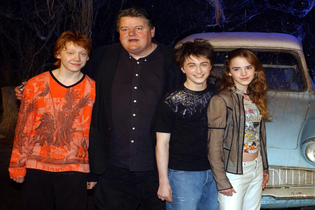 Robbie Coltrane with Harry Potter co-stars Rupert Grint, Daniel Redcliffe and Emma Watson.