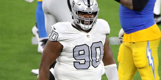 Johnathan Hankins #90 of the Las Vegas Raiders reacts after a stop against Justin Jackson #22 of the Los Angeles Chargers during the second quarter at SoFi Stadium on Oct. 4, 2021 in Inglewood, California.