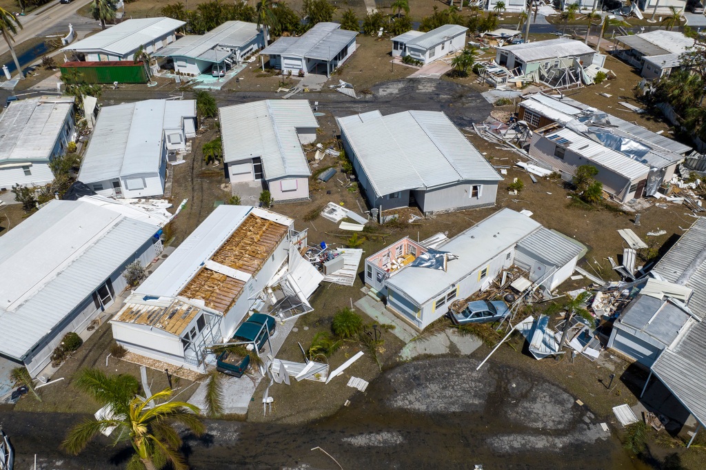 a damaged trailer park after Hurricane Ian passed by the area Saturday, Oct. 1, 2022, in Fort Myers, Fla