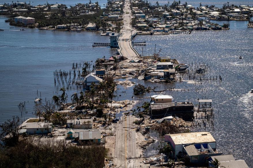 An aerial picture taken on September 30, 2022 shows the only access to the Matlacha neighborhood destroyed in the aftermath of Hurricane Ian in Fort Myers, Florida.