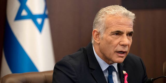 FILE - Israeli Prime Minister Yair Lapid makes an opening statement as he chairs the weekly cabinet meeting in Jerusalem, Oct. 2, 2022.