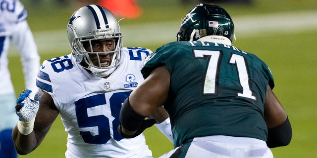 Jason Peters (71) of the Philadelphia Eagles protects the pocket from Aldon Smith (58) of the Dallas Cowboys during a game Nov. 1, 2020, in Philadelphia. 